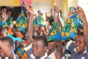Kizito School girls receive Mooncatcher pads for the first time